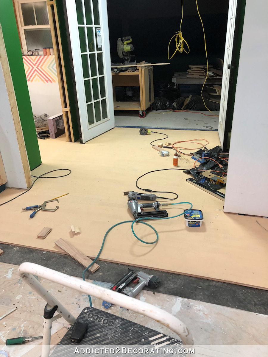 Red oak hardwood flooring installation with full trowel wood filler - before sanding
